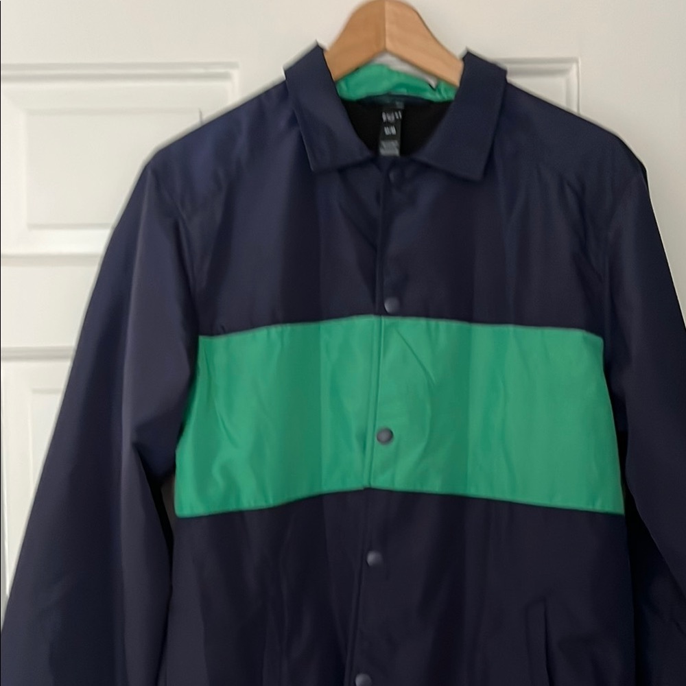 RHONE Color-Blocked Blue and Green Raincoat Lightweight Design